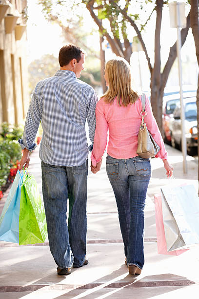 istock Couple carrying shopping 178852154
