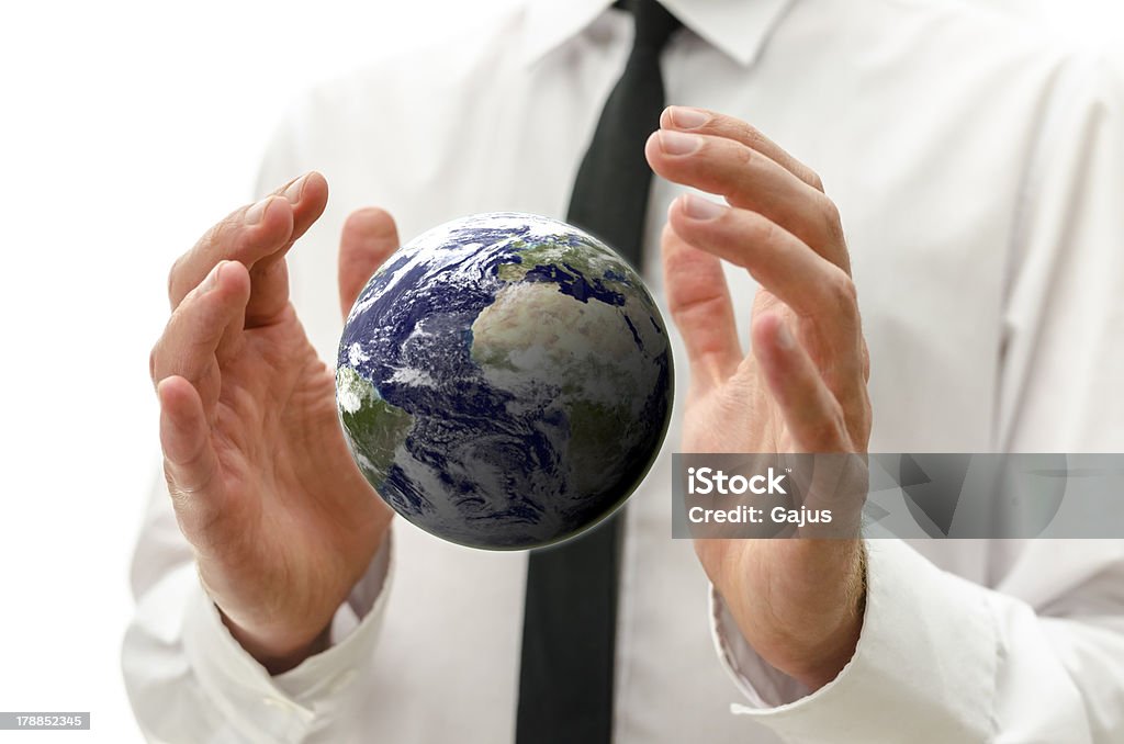 Maschile mani tenendo la terra globo. - Foto stock royalty-free di Adulto