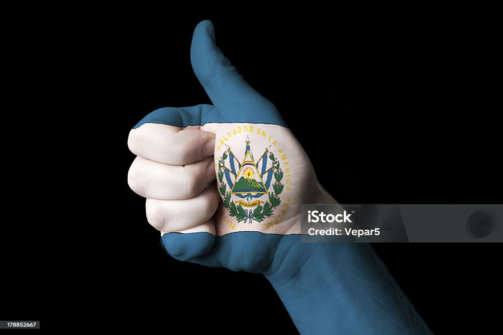 el salvador national flag thumb up gesture for excellence Hand with thumb up gesture in colored el salvador national flag as symbol of excellence, achievement, good, - for tourism and touristic advertising, positive political, cultural, social management of country Achievement Stock Photo