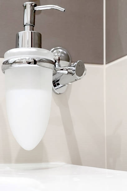 istock Faucet with soap dispenser in bathroom. 178852944