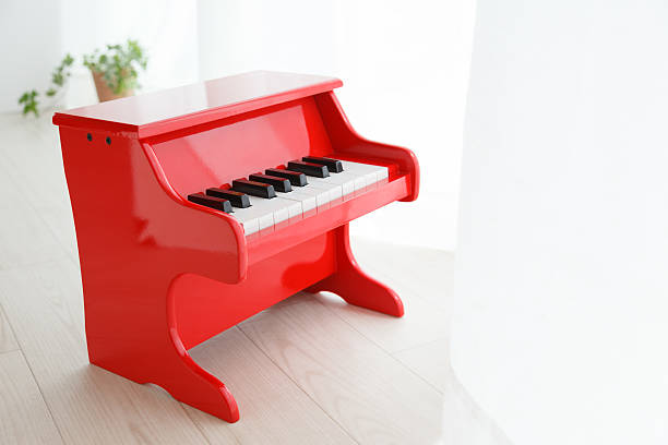 Piano by the window stock photo