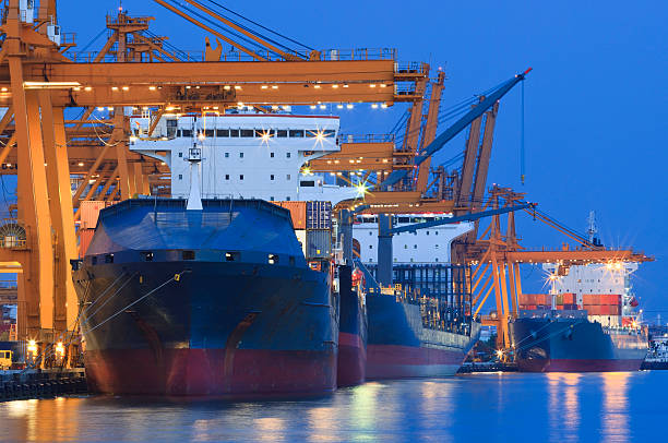 istock ship yard with heavy crane in beautiful twilight of day 178853673