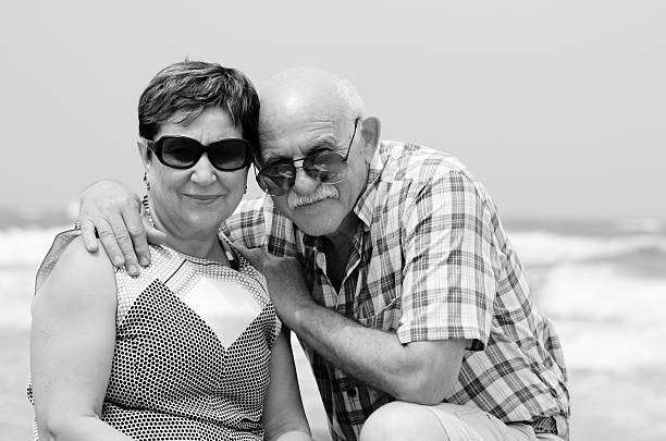 istock Happy elderly couple enjoying their retirement vacation 178853737