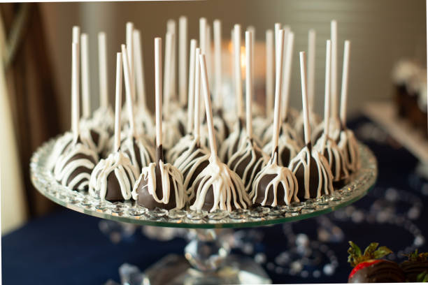istock Chocolate covered marshmellows with stripes on tray at desert bar 1788539415