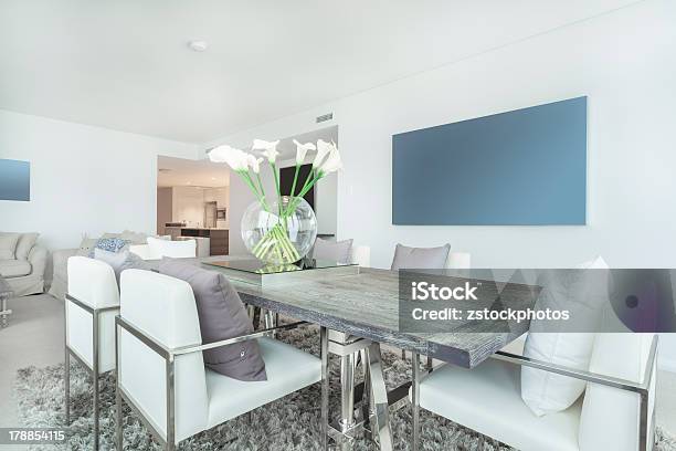 Dining Room With Gray Wood Table In Modern Apartment Stock Photo - Download Image Now