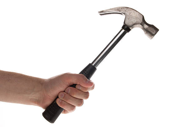 istock Man holding a metal hammer 178856477