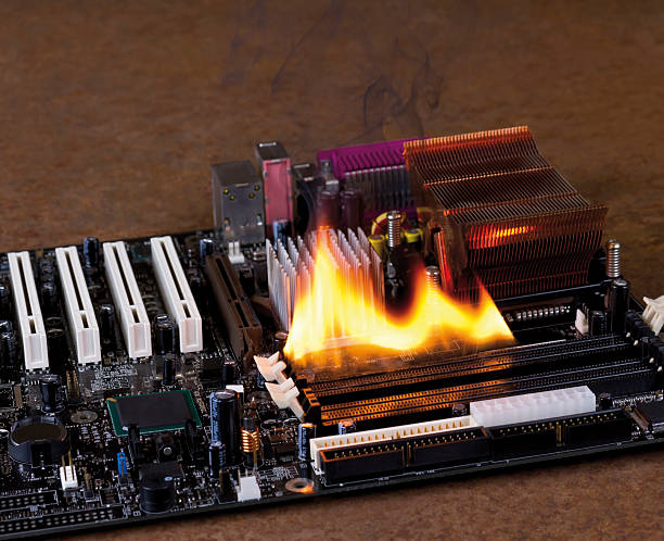 fire on electronic board stock photo