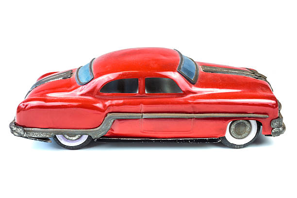 istock Fifties vintage red car toy isolated on white 178856729