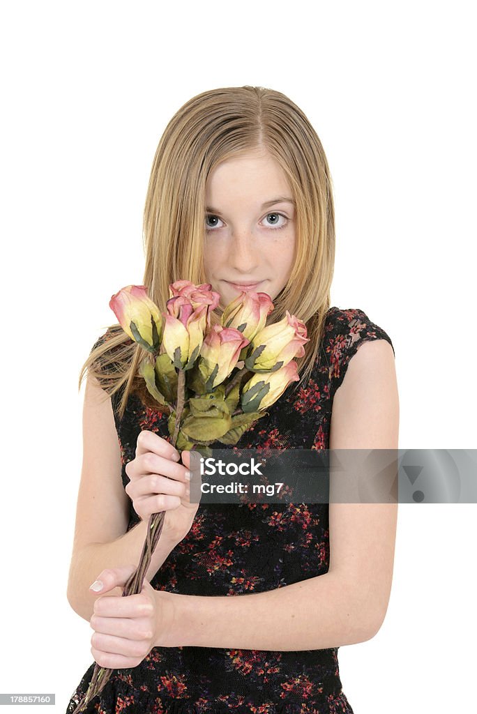 Молодой ребенок с розами - Стоковые фото Белый фон роялти-фри