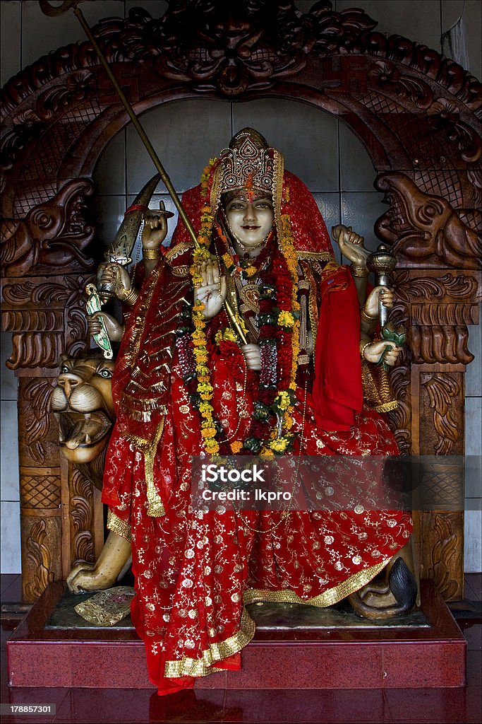 Pierre précieuse statue en bois d'une femme de l'hindouisme - Photo de Adulte libre de droits
