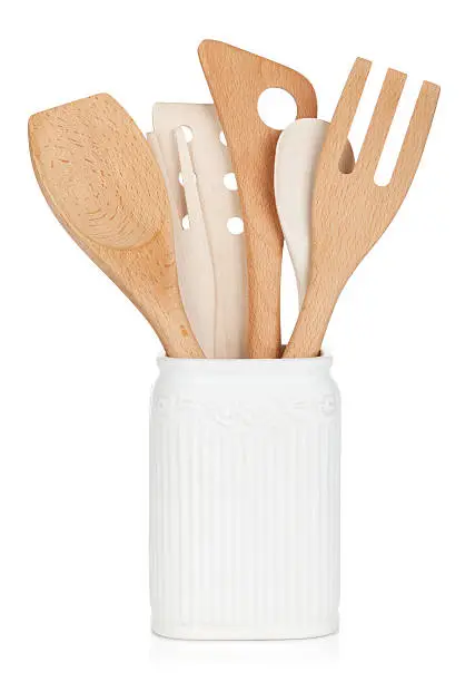 Kitchen utensils in holder. Isolated on white background