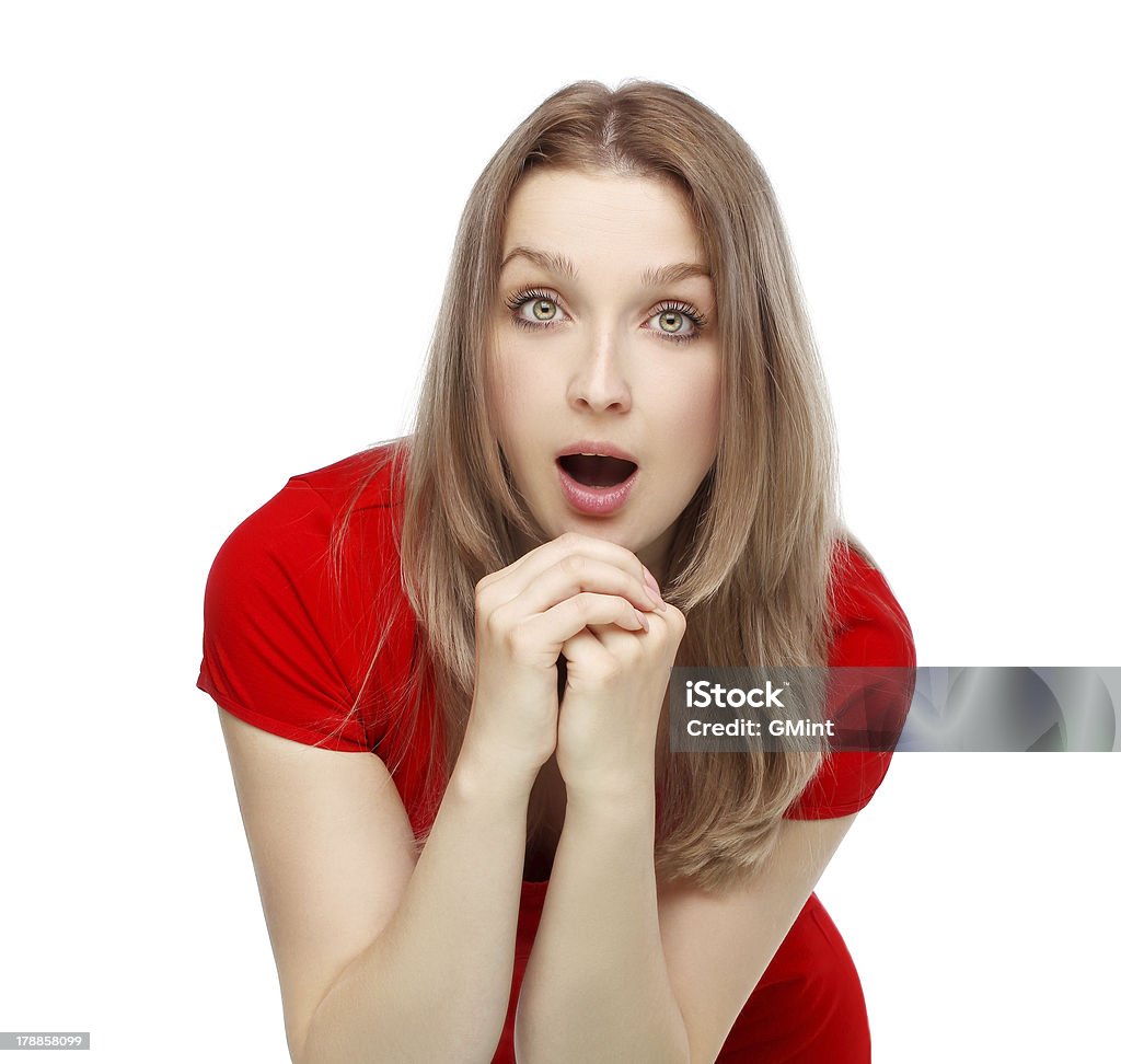 Retrato de joven sorprendido woman.White bacground - Foto de stock de 20-24 años libre de derechos