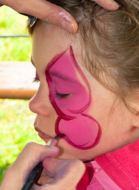 istock Child preschooler with face painting. 178858566
