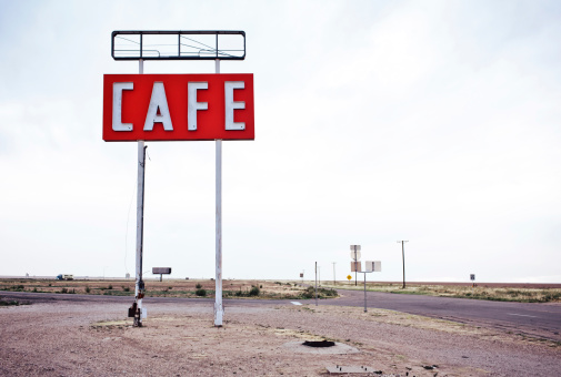 Cafe sign along historic Route 66 in Texas. Vintage Processing.