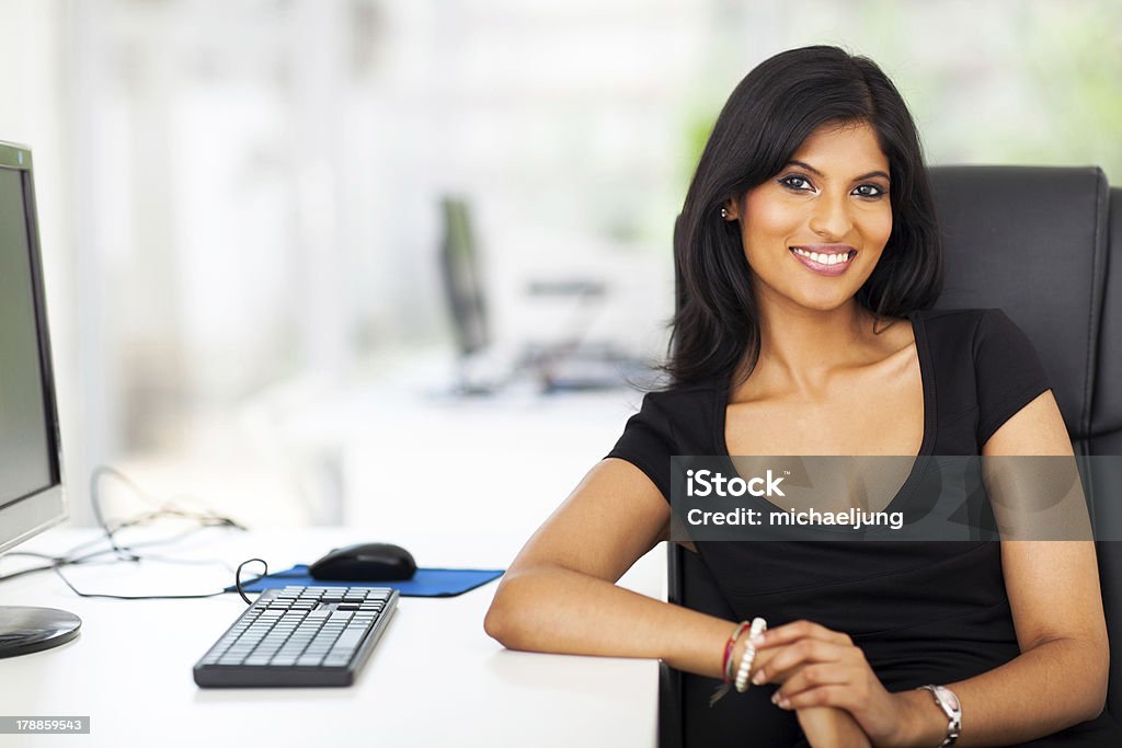 attractive female executive attractive female business executive in modern office Latin American and Hispanic Ethnicity Stock Photo