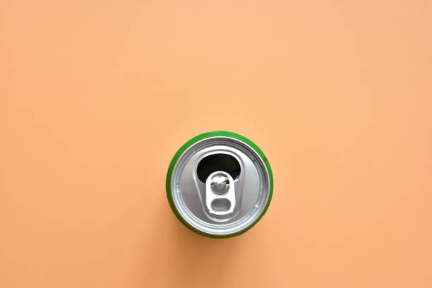 istock aluminum green drink cans on orange background, open cold fresh beverage 1788601355