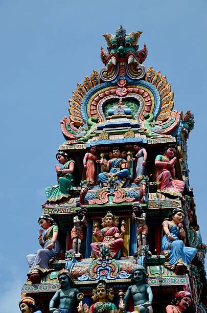 One Dravid style temple with sculptures on top on a Temple in Ujjain, India. Ujjain is famous for Mahakal jyotirlinga temple, one of twelve holy shrines of Hindu god Shiva.