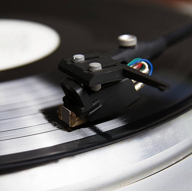 istock Turntable playing vinyl record with music 178860470
