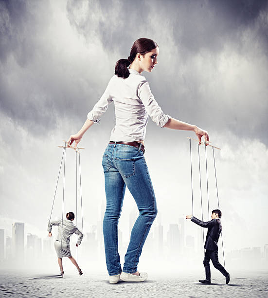 istock Businesswoman puppeteer 178860521