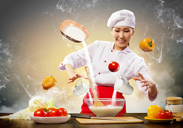 istock Asian female cooking with magic 178860714
