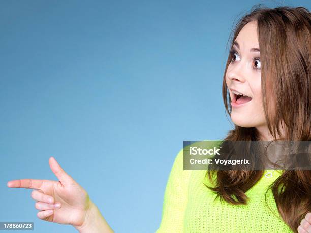 Surprised Woman Pointing And Looking Stock Photo - Download Image Now - Adult, Adults Only, Advertisement