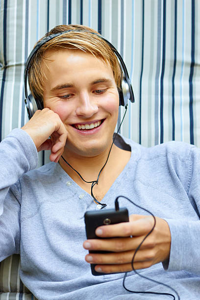 istock Good looking young male checking out song list. 178861165