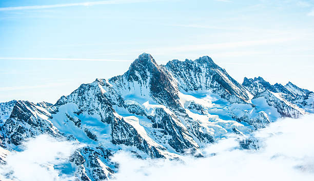 istock Beautiful snow-capped mountains against the blue sky 178862049
