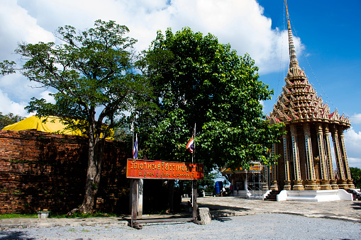 Ancient ruins stupa chedi antique mantapa or mandapa pillared hall of Wat Khao Phra Si Sanphet Chayaram temple for thai people visit praying respect buddha on November 7, 2023 in Suphan Buri, Thailand