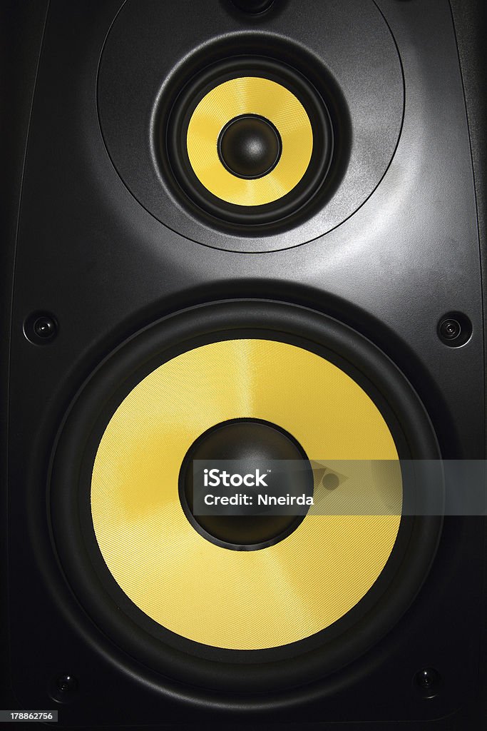 Speaker Closeup of a yellow speaker sub woofer Acoustic Music Stock Photo