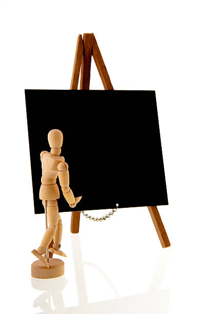 istock Blackboard with a wooden teacher 178863623