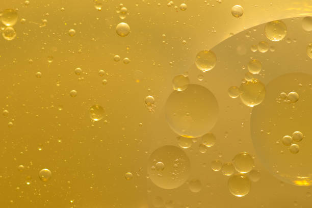 istock Oil bubble texture on gold background. 1788643267