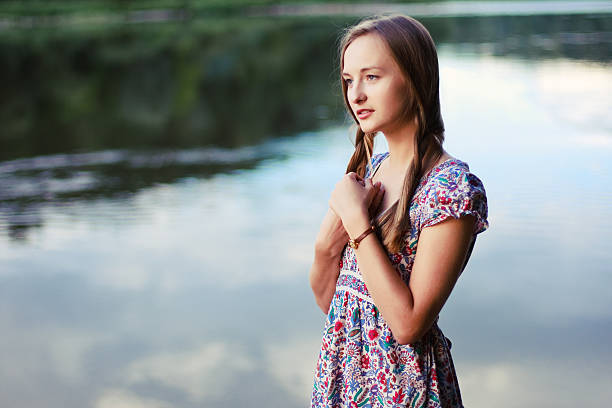 Outdoors summer portrait of beautiful young girl stock photo