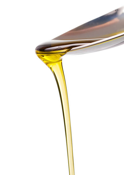 istock Olive oil and spoon 178864939