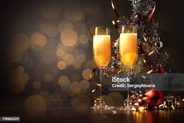 Glasses Of Champagne At New Year Party Stock Photo - Download Image Now - Anniversary, Backgrounds, Celebration