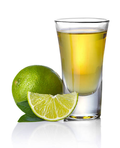 istock Gold tequila shot with lime isolated on white 178865558
