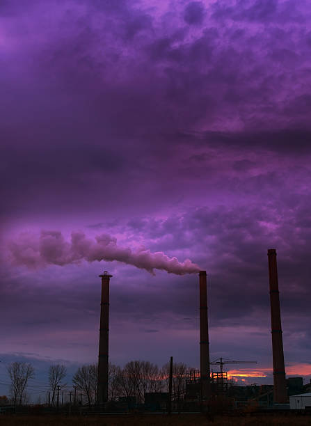istock Heavy smoke spewed from coal powered plant 178865675