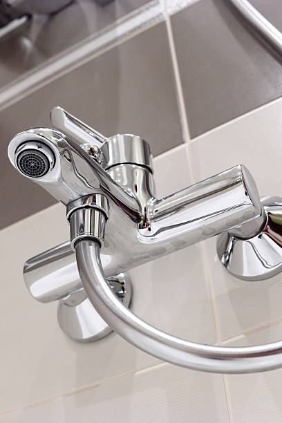 istock Modern designer tap and shower in bathroom. 178866402