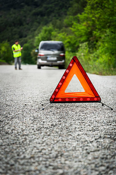 istock Man for help by having your car damaged in road 178867466