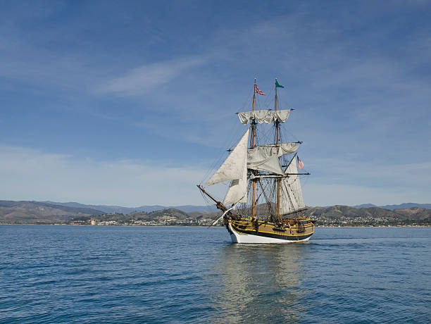 Sail ship by California coast stock photo
