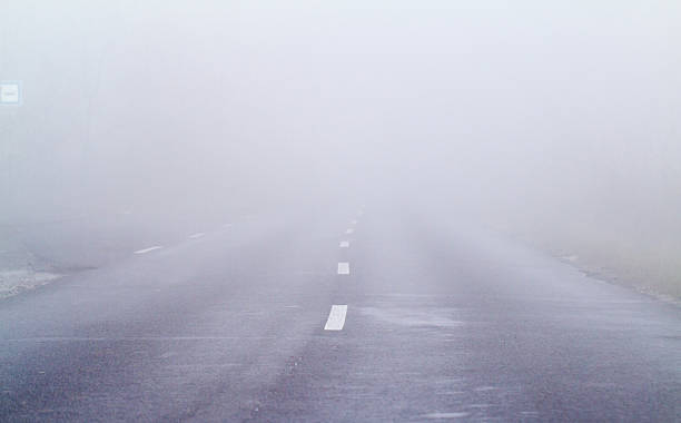 istock Asphalt road in an autumn fog 178868497