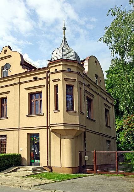 istock pretty retro house with tower in Krakow 178868567