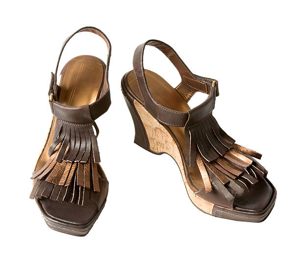 istock Wedge fringed leather sandals 178869401