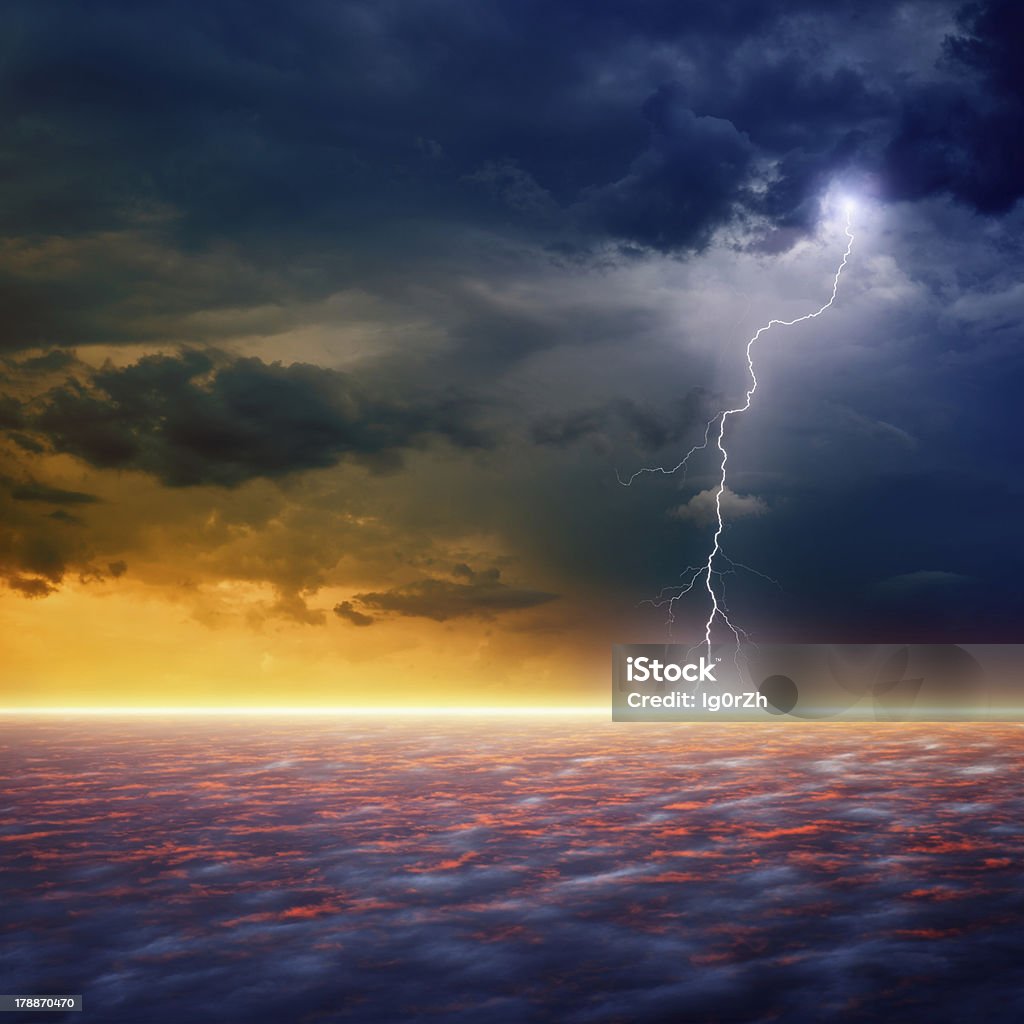 Dramatic sunset Dramatic apocalyptic background, end of world, bright lightnings, armageddon, hell Accidents and Disasters Stock Photo