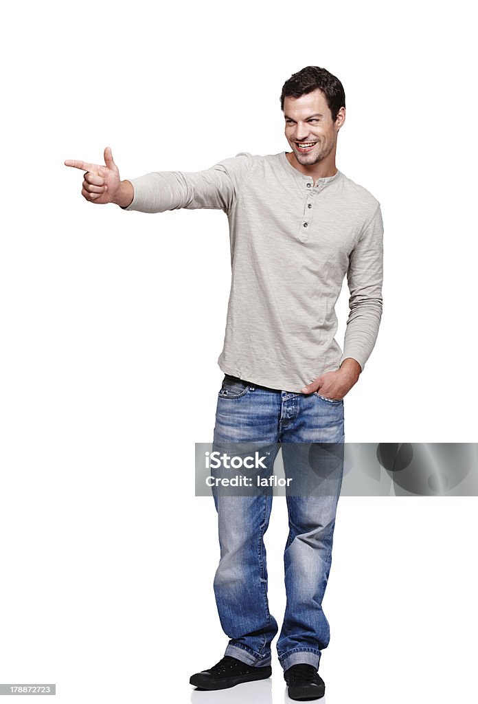 I got you in my sights! A handsome young man pointing at someone while isolated on a white background Happiness Stock Photo