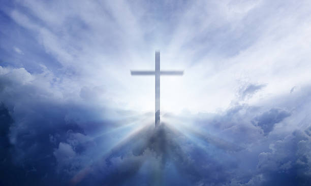 istock Heavenly cross in the sky with clouds and sun rays 178873844