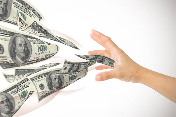 istock gather money in hand 178874728