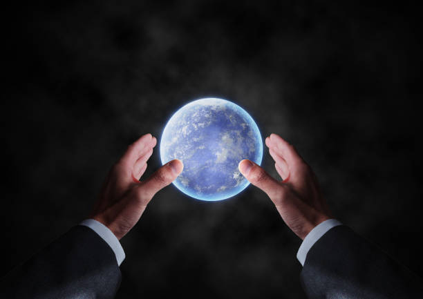 istock Earth-like planet in hand 1788748457