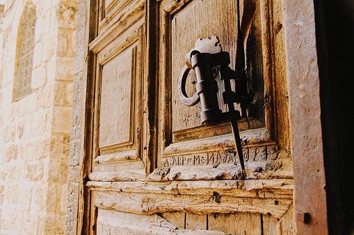 Rustic bolt on wooden Church door, Jerusalem