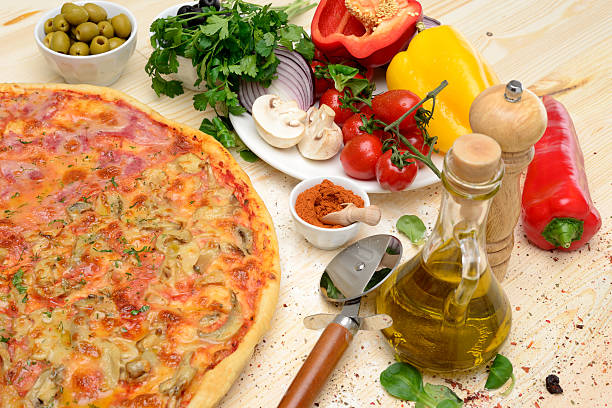 Pizza on the wooden table stock photo