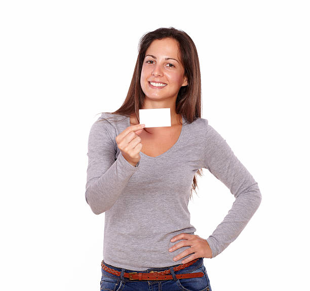 istock Beautiful lady holding card smiling at you 178875411